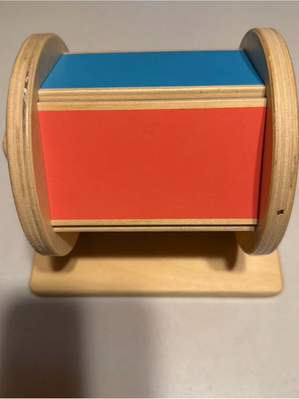 Lovevery brand Wooden Spin Learning Drum Toy in Yellow and Green